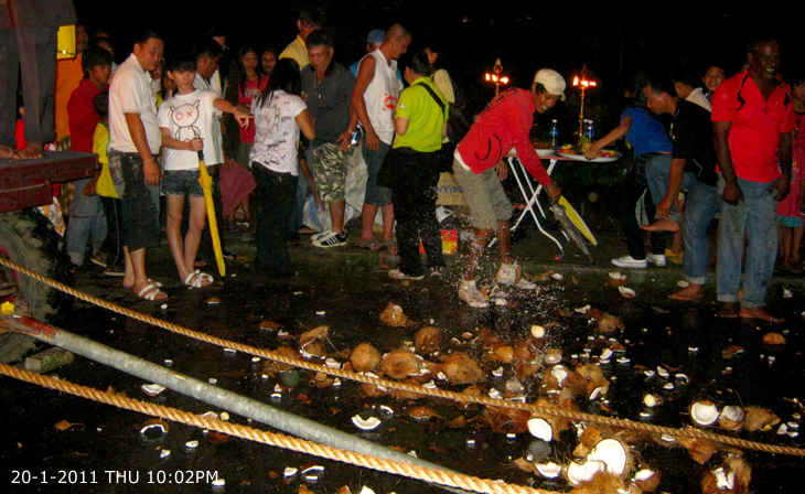 Smashing of Coconuts